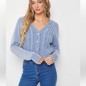 Blue cable knit cardigan sweater